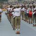 Corp members from the NYSC Band render the National Anthem at the event