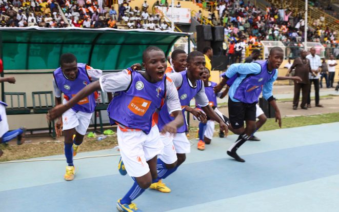 Euphoric moments for the substitute players of Pakoto High School after the final whistle that confirmed their victory